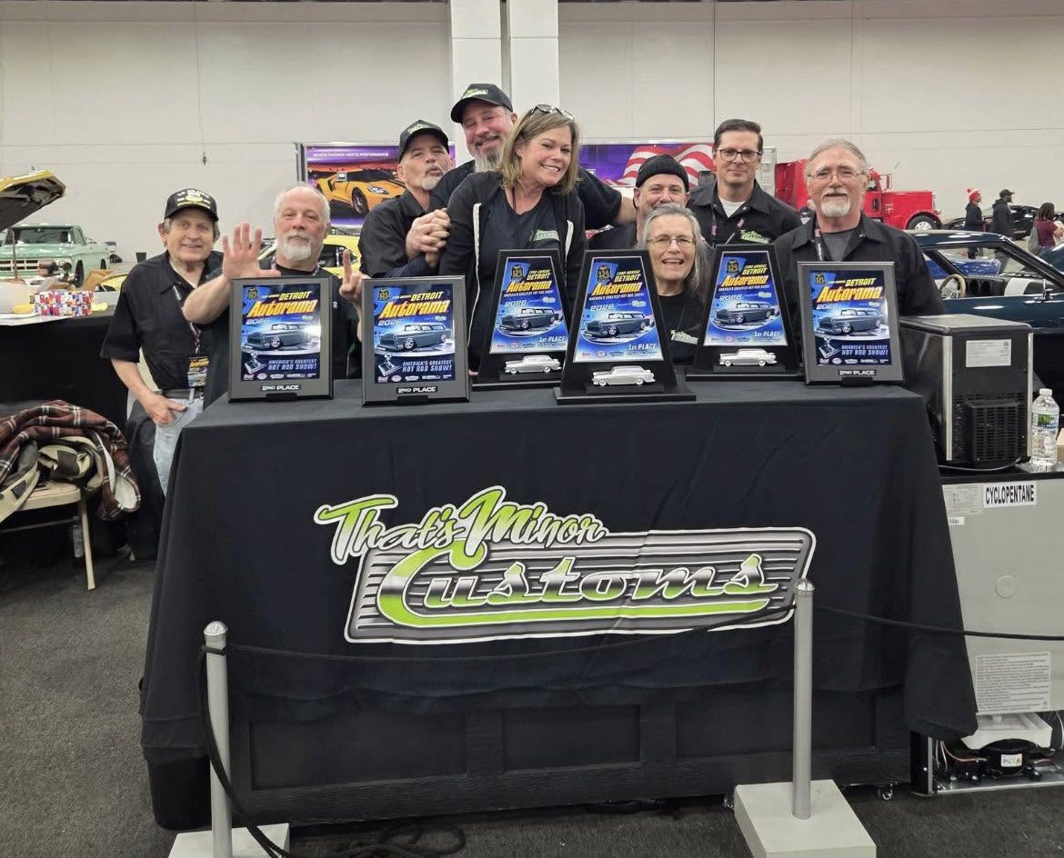 That's Minor Customs team and clients gathered behind six awards at Detroit Autorama 2026